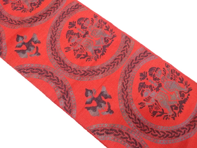 丸紋に向かい動物模様織り出し名古屋帯